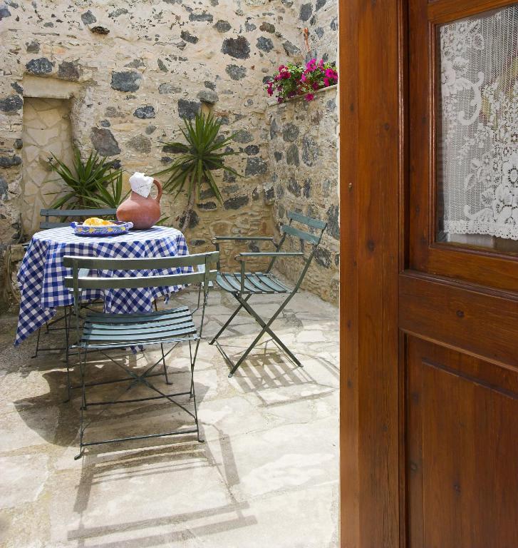 Blue Cottage Apsiou Rum bild